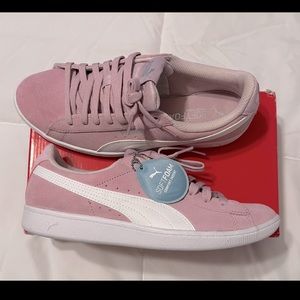 Pink puma sneaker with soft foam comfort insert.